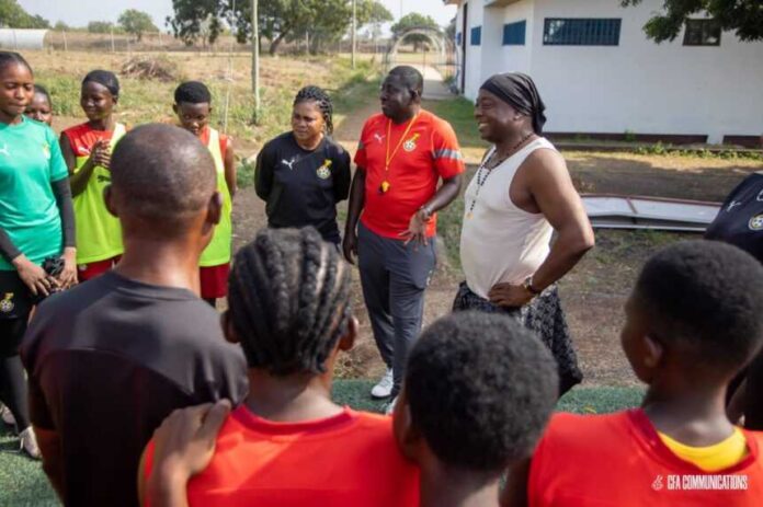 3-time African Footballer of the Year, Abedi Pele, having a word with the Black Maidens