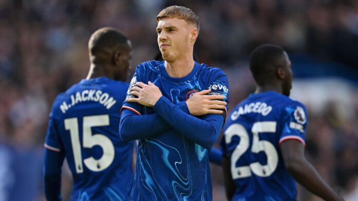 Cole Palmer celebrates his goal as Chelsea beat Aston Villa 3-0 to move joint second