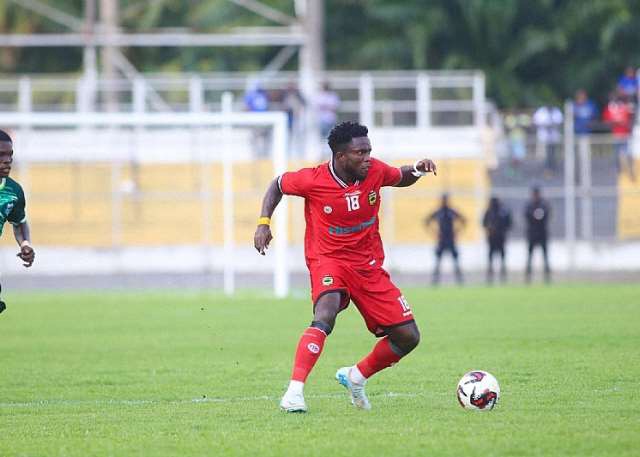 Albert Amoah (striker) in action for his side Kumasi Asante Kotoko in the Ghana Premier League.